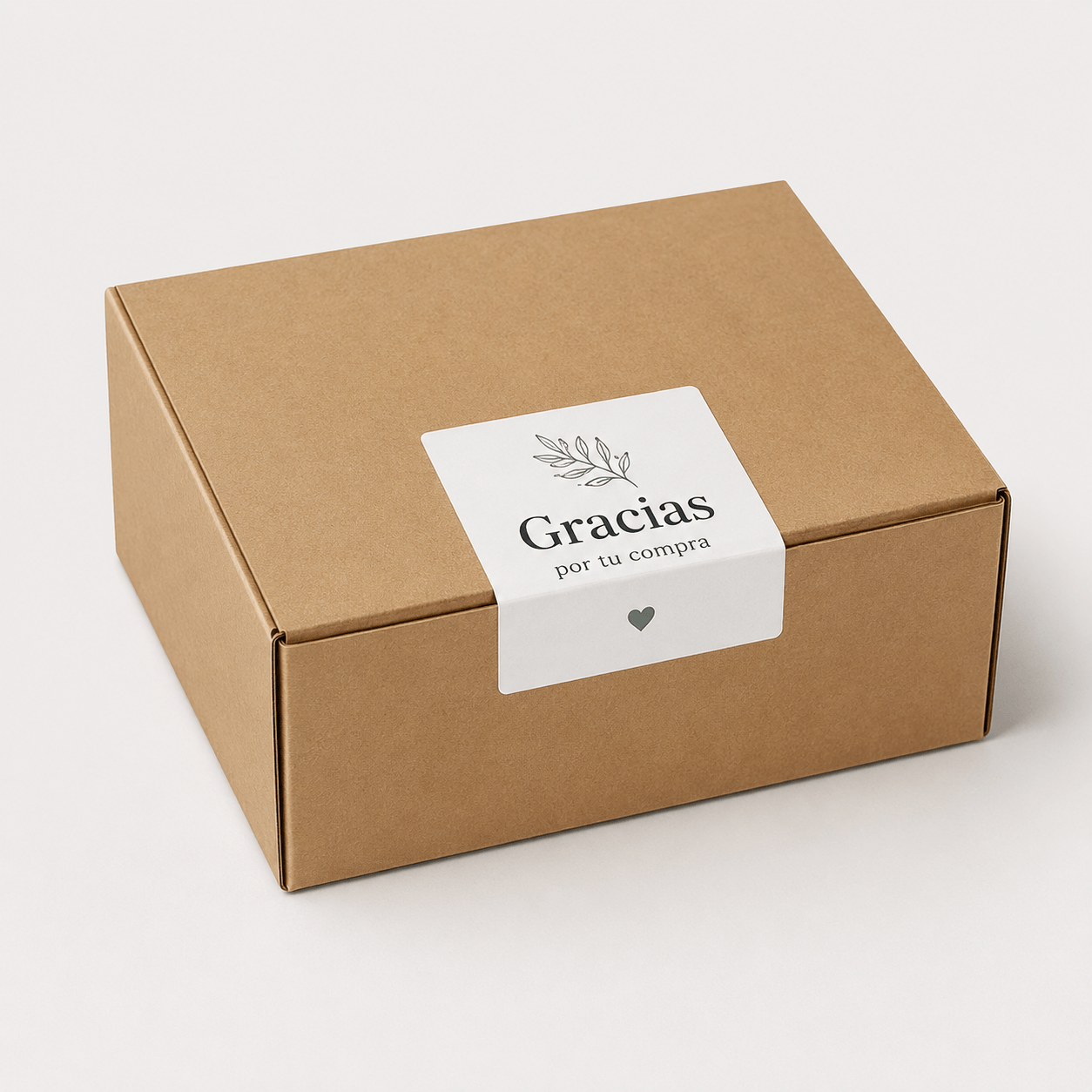 Pegatina personalizada cuadrada cerrando una caja de ecommerce con el mensaje Gracias por tu compra